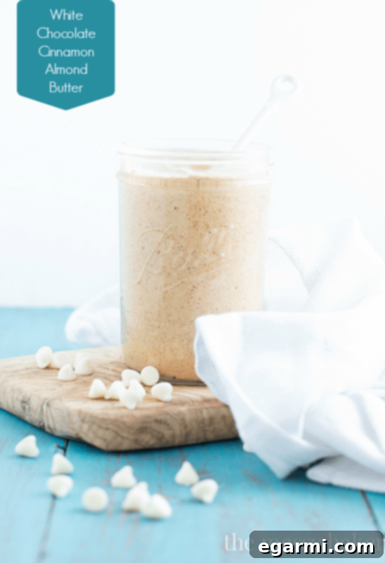 Creamy White Chocolate Cinnamon Almond Butter in a jar, ready to be enjoyed