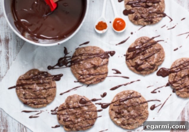 A plate of freshly baked Double Chocolate Brownie Cookies with Sriracha Ganache, ready to be enjoyed.