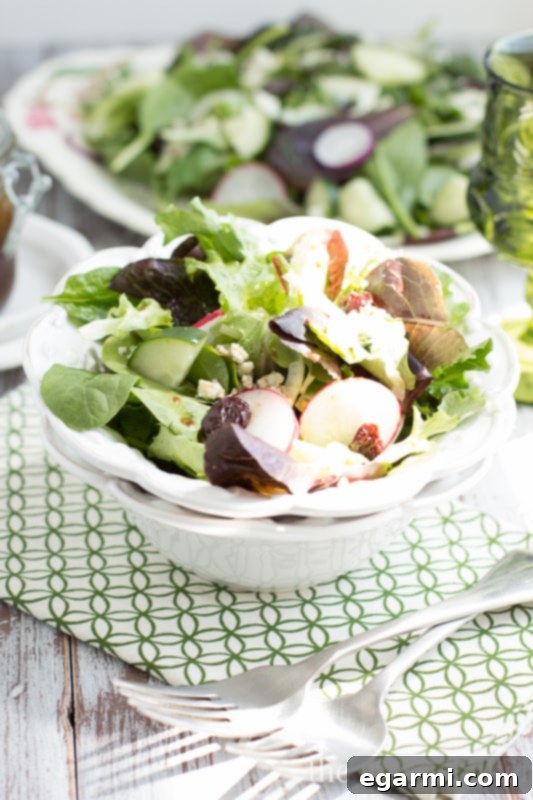 Bright Fennel Radish Salad with Cherry Balsamic 8 Fennel & Radish Salad Dressed - The fresh salad tossed lightly with the homemade Cherry-Balsamic Vinaigrette, ready to be served.