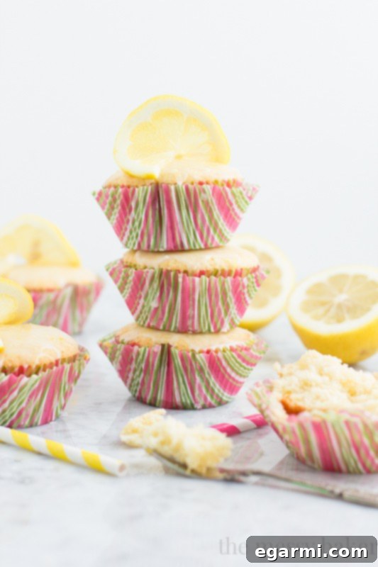 Baked Lemon Cupcakes cooling on a wire rack
