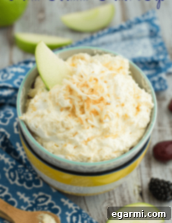 Pina Colada Fruit Dip in a bowl, ready to serve.
