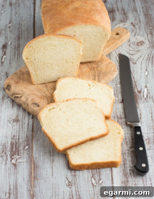 Family Member Smiling While Holding Freshly Baked Bread | Joy of Baking