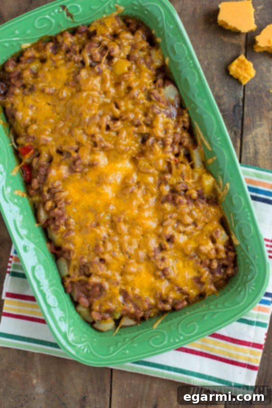 Hearty Loaded Potato and Baked Bean Bake 7 The Loaded Baked Potato & Baked Bean Casserole fresh out of the oven, bubbly and golden, ready to be served