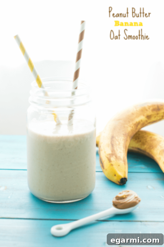 Energizing Peanut Butter Banana Oat Smoothie 2 Thick and creamy Peanut Butter Banana Oat Smoothie in a glass, ready to be enjoyed.