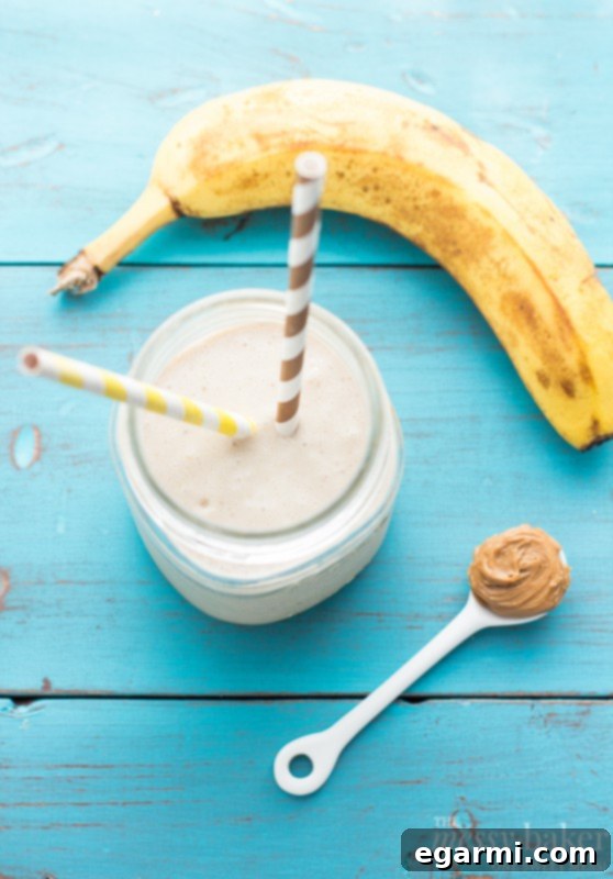 Energizing Peanut Butter Banana Oat Smoothie 3 Close-up of a Peanut Butter Banana Oat Smoothie, showcasing its smooth texture.