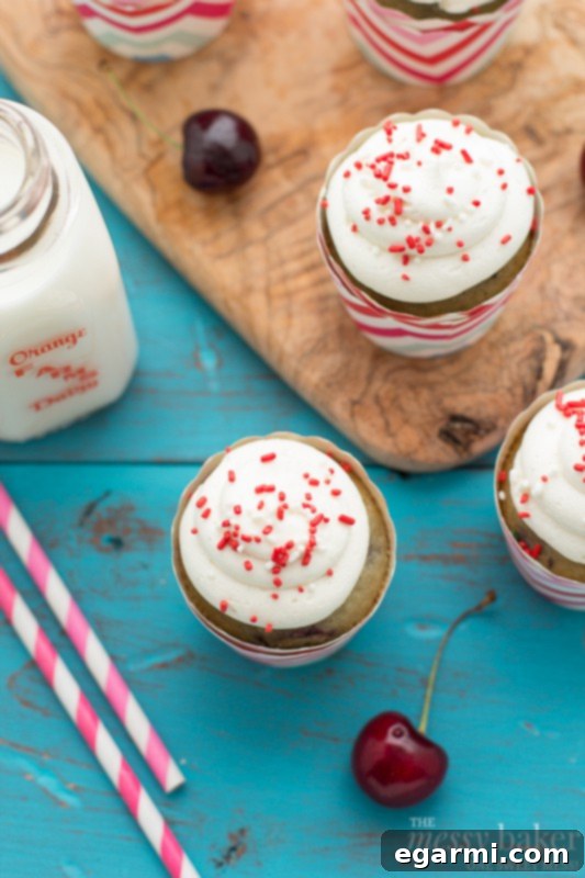 Close-up of Cherry Chocolate Chip Cupcake with Sprinkles