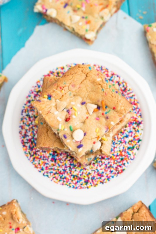 Another enticing angle of Malted Milk Funfetti Blondies, highlighting their vibrant colors.