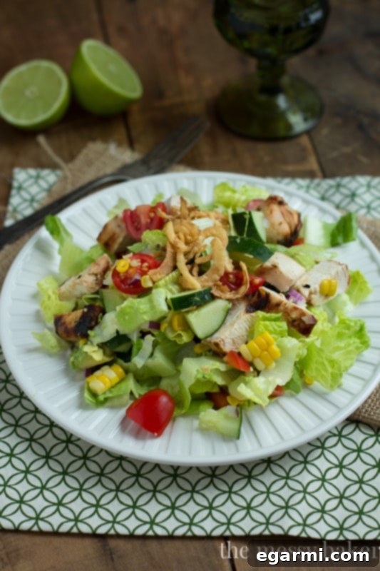 Tequila-Lime Chicken Chopped Salad with a fork ready to be eaten