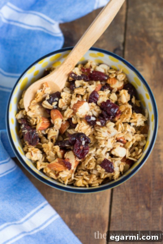 Freshly baked Cranberry Orange Granola on a cooling rack