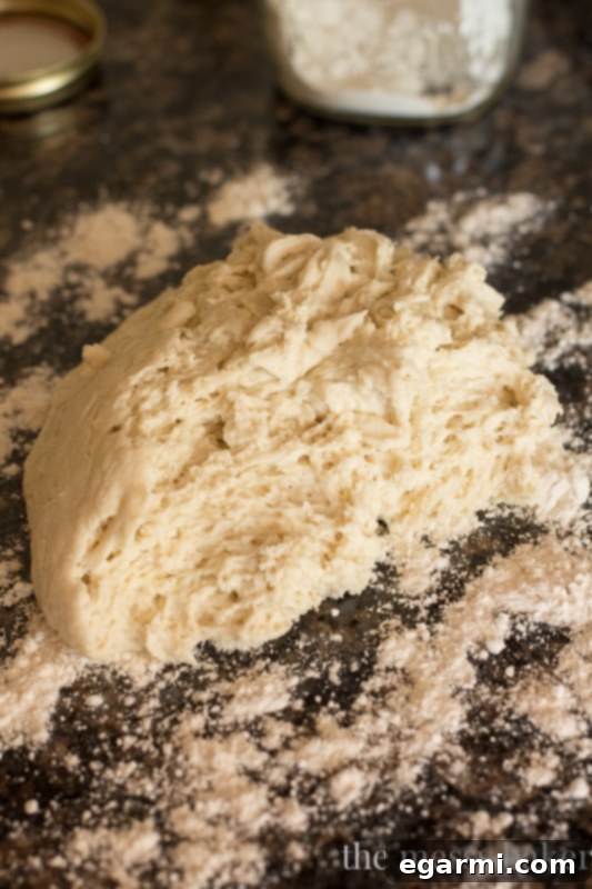 Close-up of sticky gluten-free pizza dough in a bowl