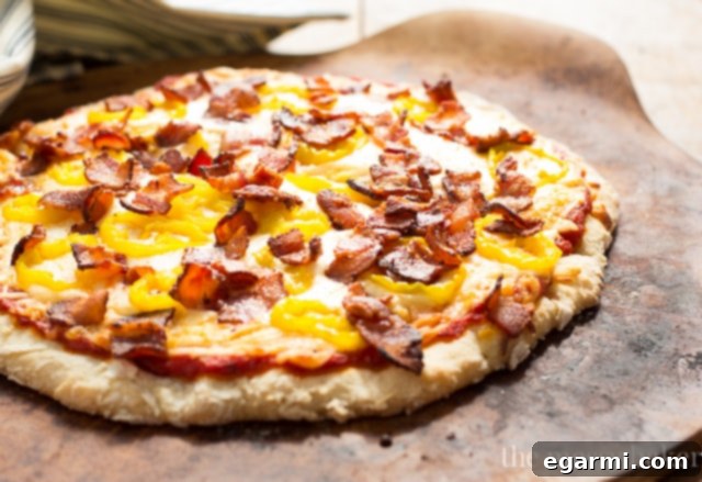 Delicious gluten-free pizza fresh out of the oven, ready to be sliced