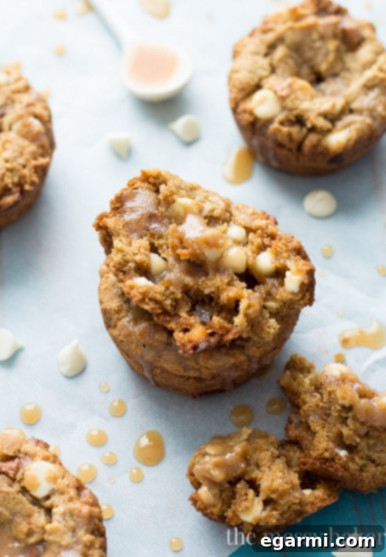 Cookie Cups with Caramel A close-up view of Gluten-Free White Chocolate Pumpkin Cookie Cups drizzled with Apple Cider Caramel