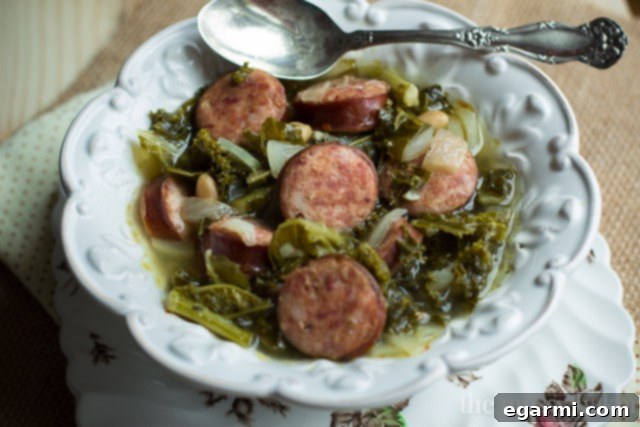 Hearty Slow Cooker Kielbasa Soup with Kale and White Beans