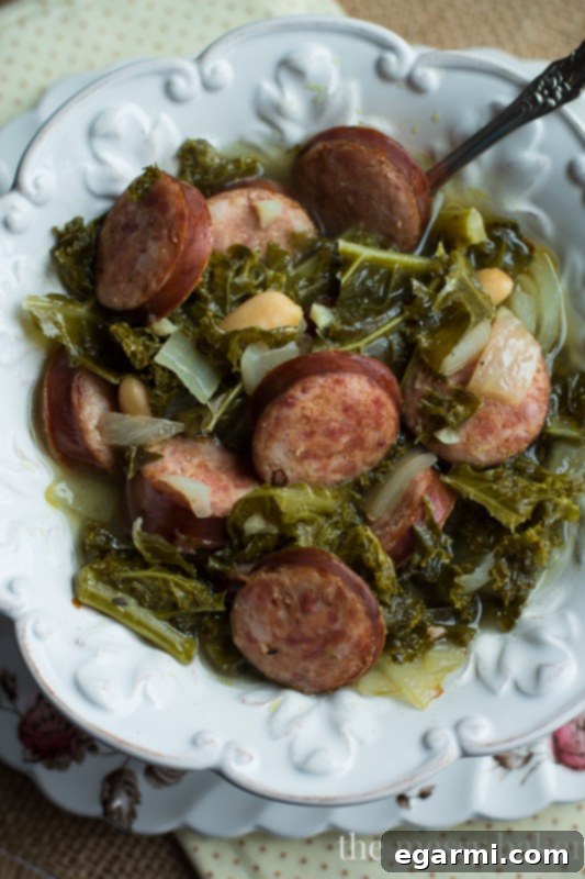 Kielbasa Soup with Kale and White Beans in a bowl