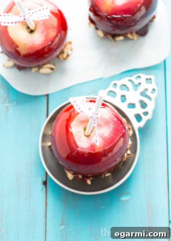 Finished Red Moscato Candied Apples with Nut and Chocolate Toppings