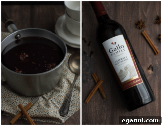 Cozy Pomegranate Mulled Wine for Sunday Supper 3 Pomegranate Mulled Wine | Close up of a mug filled with spiced wine