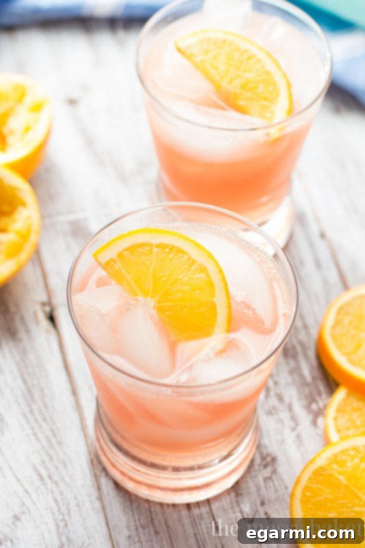 Cranberry Orange Crush Cocktail – Festive holiday drink for Thanksgiving dinner.