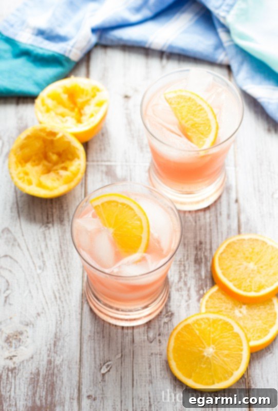 Cranberry Orange Crush Cocktail recipe with fresh ingredients.
