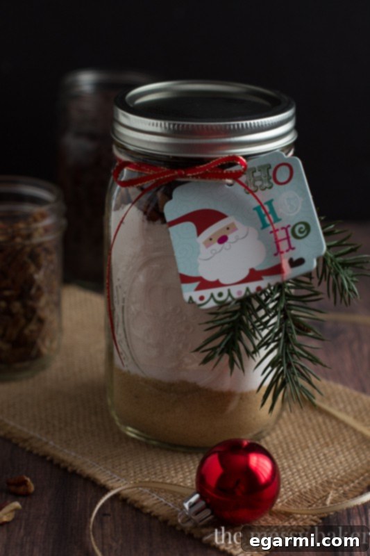 Step-by-step layering of ingredients for Chocolate Chip Pecan Banana Bread Gift Jars