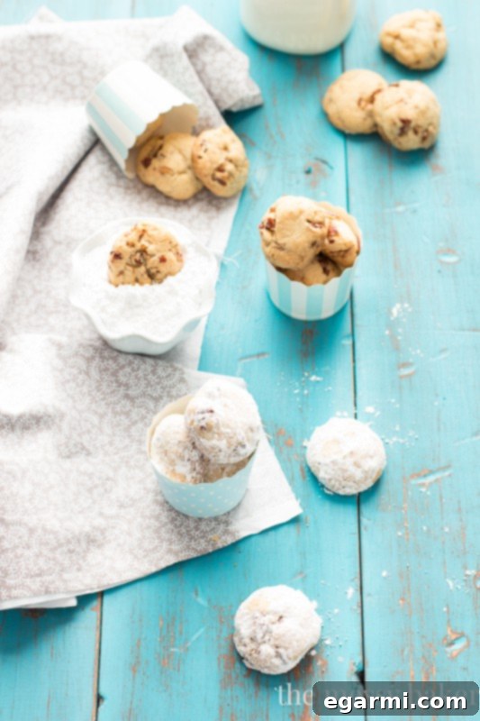 Homemade Pecan Sandies cookies arranged on a plate, showcasing their delicate texture and nutty goodness.