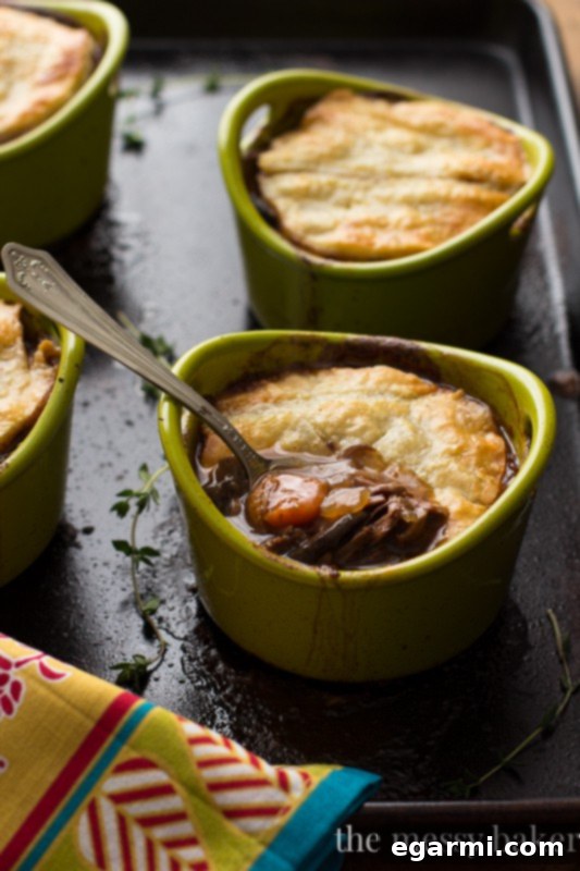 Classic Steak and Mushroom Pie, a perfect holiday meal with tender beef and rich gravy.