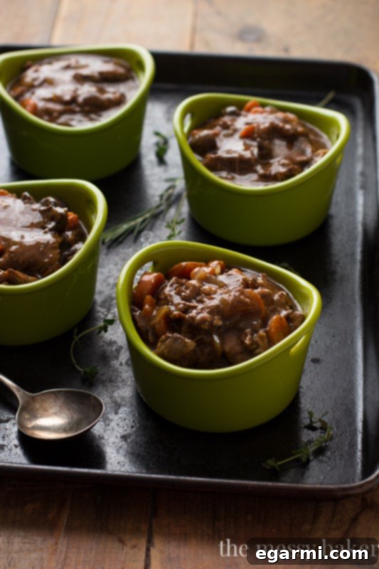Hearty Steak and Mushroom Pie made easy with a slow cooker, ideal for busy holidays.