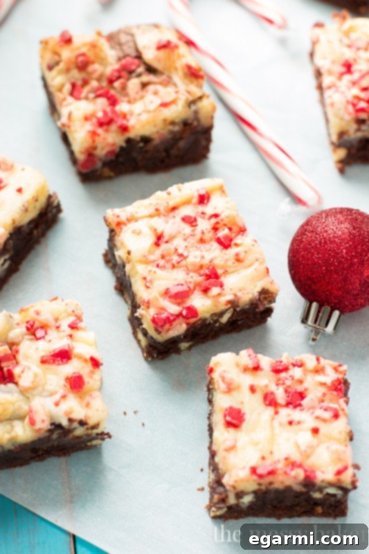 Peppermint Cheesecake Swirl Brownies | www.themessybakerblog.com