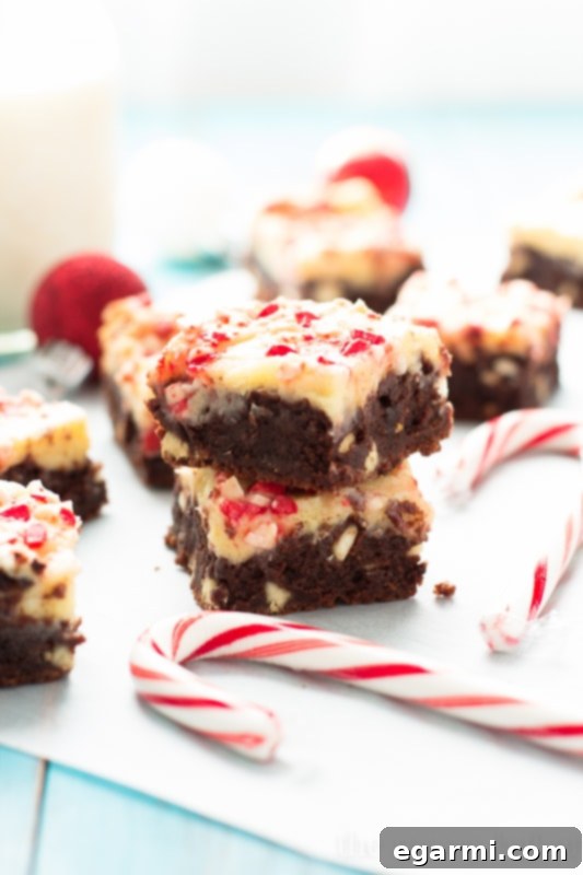 Peppermint Cheesecake Swirl Brownies | www.themessybakerblog.com
