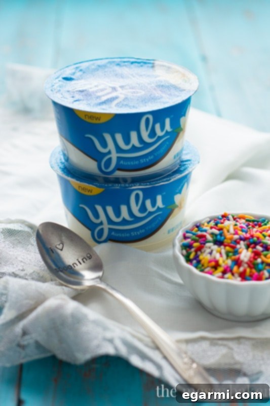 A blending pitcher filled with ingredients for the Healthy Funfetti Shake, showing the smooth, blended mixture.