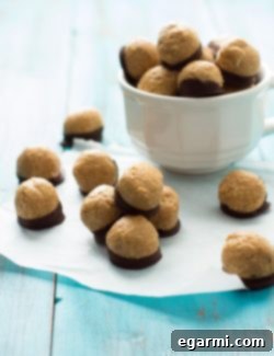 A close-up shot of a healthy peanut butter buckeye recipe card with an image of the finished treat