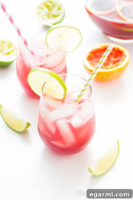 A large pitcher of Sangrita, filled with ice and citrus slices, ready to be served.
