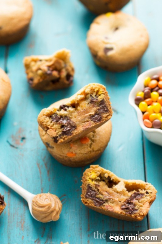 Peanut Butter Stuffed Chocolate Chip Cookie Cups | www.themessybakerblog.com