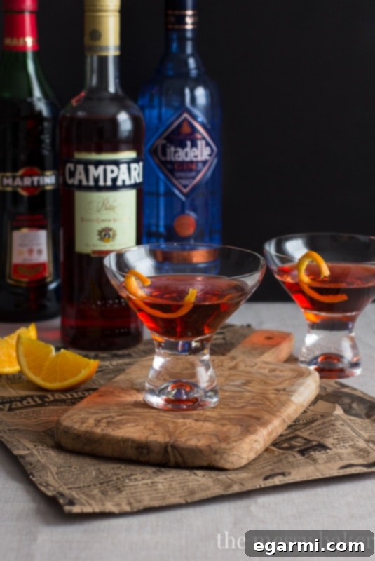 Classic Negroni Cocktail | A mixture of gin, campari, and sweet vermouth in an elegant glass.
