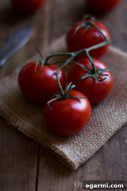 Close-up of fresh, vine-ripened tomatoes, ideal for roasting
