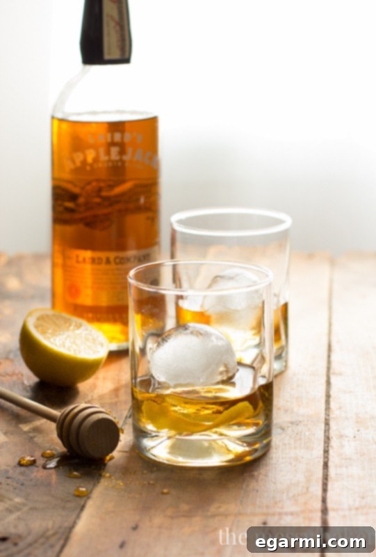 Honey Jack Cocktail | A refreshing mixture of AppleJack liquor, fresh lemon juice, and honey