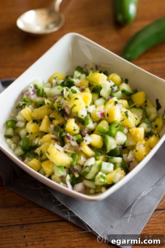 Close-up of Pineapple Cucumber Salsa showing the fresh diced ingredients