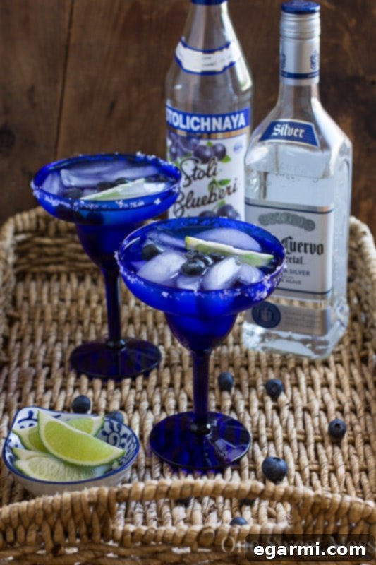 Refreshing Blueberry Margaritas ready for a summer party