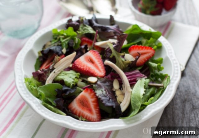 Strawberry Chicken Salad with Toasted Almonds 4 Chicken, Strawberry & Toasted Almond Salad with Strawberry Balsamic Vinaigrette