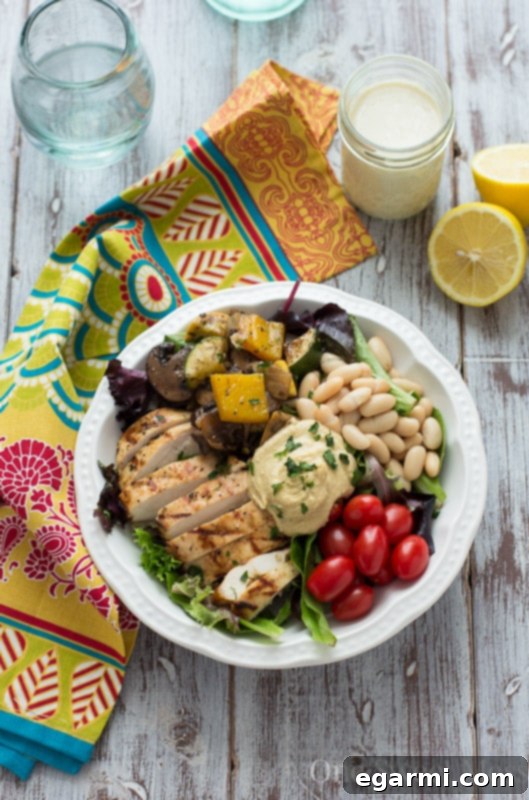 Mediterranean Chicken & Grilled Veggie Salad with Hummus and Lemon Tahini Dressing