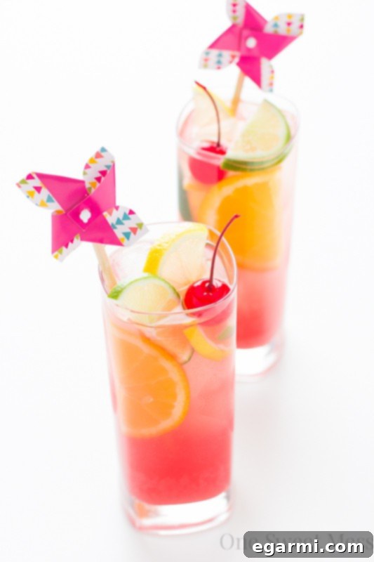 Vibrant Tiki Punch Cocktail, perfect for summer gatherings, showcasing its rich colors and tropical appeal