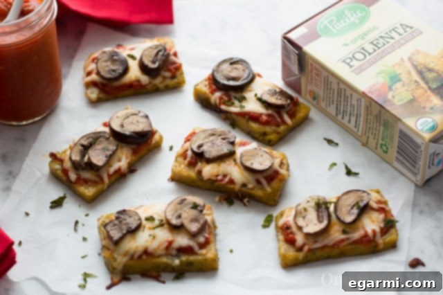 Oven-baked Mini Polenta Pizza Bites on a Baking Sheet