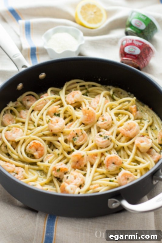 Creamy Lemon Butter Shrimp Linguine 3 Close-up of freshly cooked Shrimp Linguine with Lemon Butter Sauce, garnished with herbs
