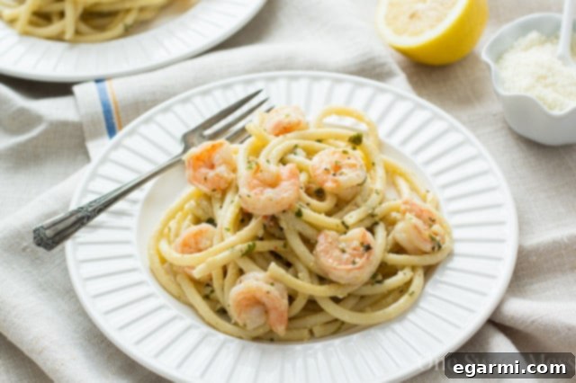 Creamy Lemon Butter Shrimp Linguine 4 Bowl of Shrimp Linguine with Lemon Butter Cream Sauce, ready to serve