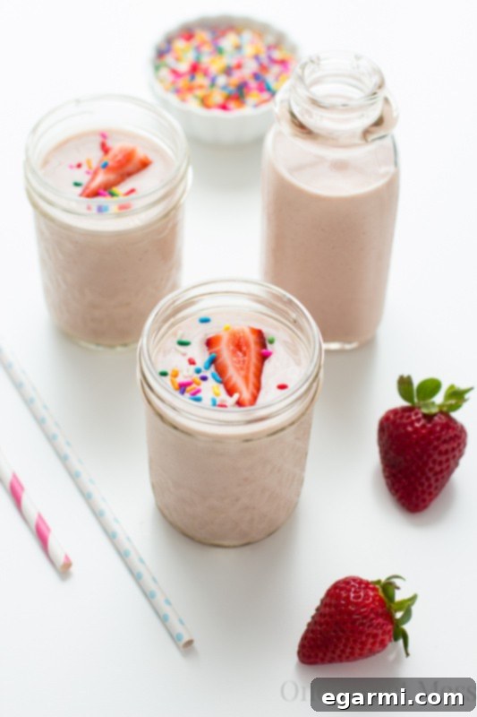 Strawberry Banana Birthday Cake Smoothie 2 Delicious Strawberry-Banana Cake Batter Smoothie with sprinkles