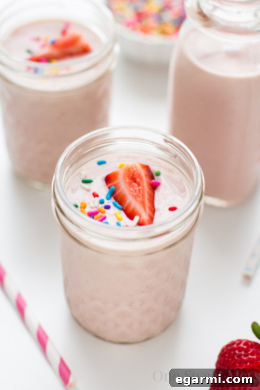Strawberry Banana Birthday Cake Smoothie 3 Closeup of Strawberry-Banana Cake Batter Smoothie in a glass
