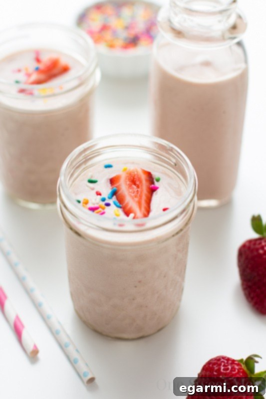 Strawberry Banana Birthday Cake Smoothie 6 Strawberry-Banana Cake Batter Smoothie with sprinkles and straws