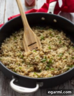 Cooking bulk hot sausage in a large skillet, browning until crispy