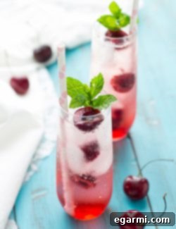 Sweet Cherry Prosecco Sparkler 7 Cherry-Kissed Prosecco Spritzer cocktail in a glass