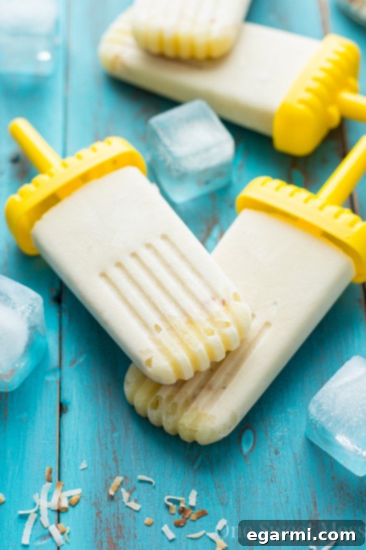 Kid-friendly Vegan Piña Colada Popsicles - Guilt-free summer dessert
