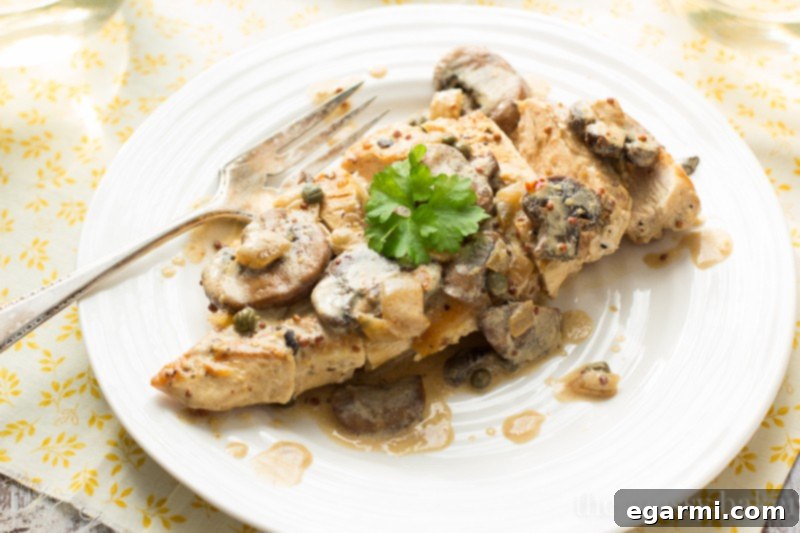 A gourmet yet easy Creamy Dijon Chicken with Mushrooms dish, ideal for a quick and flavorful dinner.